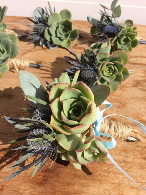 Deluxe Buttonholes- A Touch of Class Florist