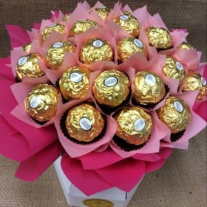 a chocolate bouquet of 30 ferrero rocher chocolates wrapped in pink
