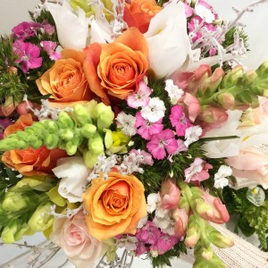 a brightly coloured bouquet of seasonal flowers.