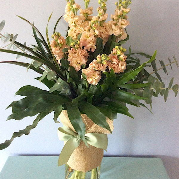 vase arrangement of seasonal stocks- A touch of Class Florist