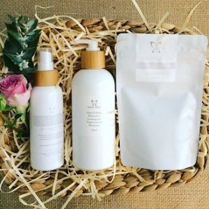 Hamper of Goodness Contains 3 Salted Bliss body and bath products packaged in a seagrass basket - A Touch of Class Florist
