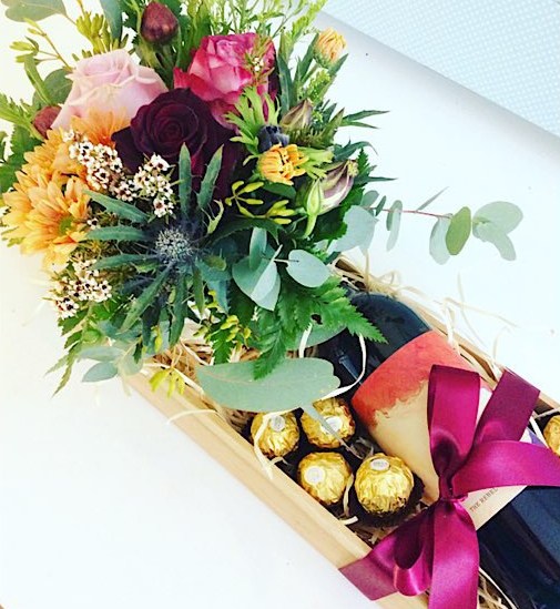 Wine, chocolate and flowers! What is not to love about the Just for you gift ahmper diplayed ina bamboo reusable box - A touch of Class florist