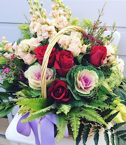 Cottage Flower Basket is a traditional basket arrangement in pink, white and red toned flowers - A Touch of Class Florist