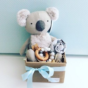 Baby Aussie Bundle in Blue includes Keith the Koala from Nana Huchy, a teething ring from Natre Bubz and an item of baby clothing gift wrapped in a box for you - A Touch of Class Florist Perth