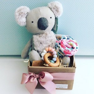 Baby Aussie Bundle in Pink includes Keith the Koala from Nana Huchy, a teething ring from Natre Bubz and an item of baby clothing gift wrapped in a box for you - A Touch of Class Florist Perth