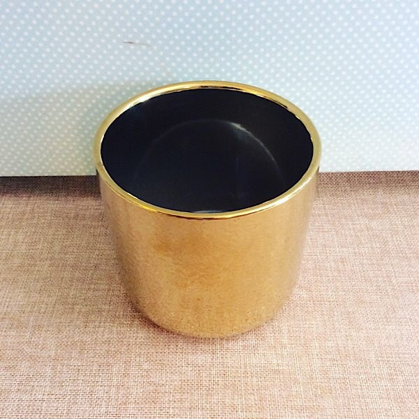 Gold Ceramic Pot is a gold cylinder pot approximatley 12cm x 13cm - A Touch of Class Florist Perth