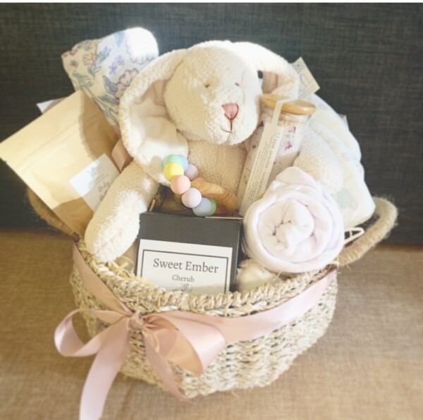 Classic Baby Hamper in Pinks is a hamper with a some gifts for a newborn and some gifts for mum! Gift wrapped and resented in a hamper basket by A Touch of Class Florist Perth.