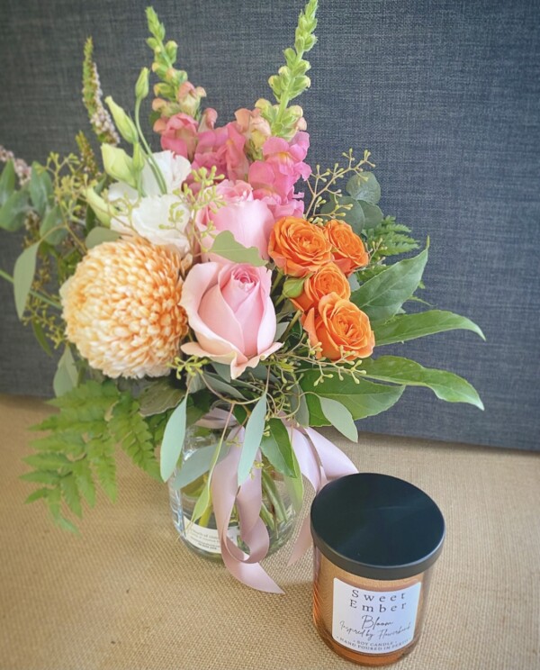 Gift for You Rose Gold and Black by A Touch of Class Florist Perth includes a seasonal jam jar of fresh flowers and a Sweet Ember candle, scent will vary, in a Rose gold jar with a black lid.