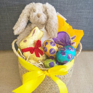 Little Bunny Easter Basket is a gorgeous treat! A Baby honey bunny soft toy from Nana Huchy, a selection of easter eggs all tied up in a reusable basket.